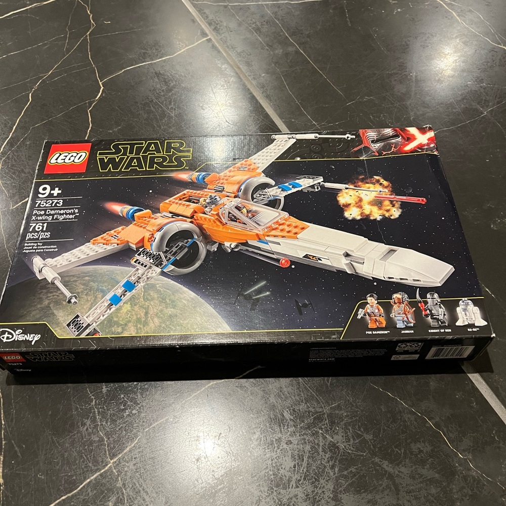 Lego 75273: Star Wars Poe Dameron's X-Wing Fighter.  Never assembled